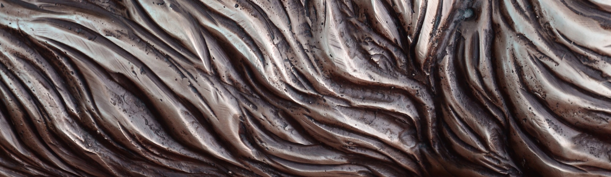 Details and decorative bas-relief ornament from metal of forged stamping iron gate